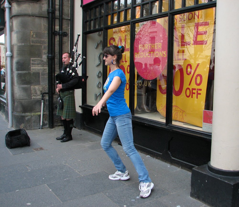 Anastasiia Gavryliuk performing a highland dance on the street of St Andrews